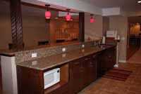 bar counter in basement with microwave nook