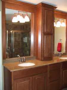 cherry cabinets and granite countertops in remodeled bathroom lg