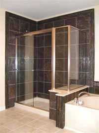 Updated bathroom with Black marble tile shower