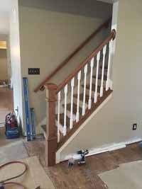 custom stair railing and flooring in progress