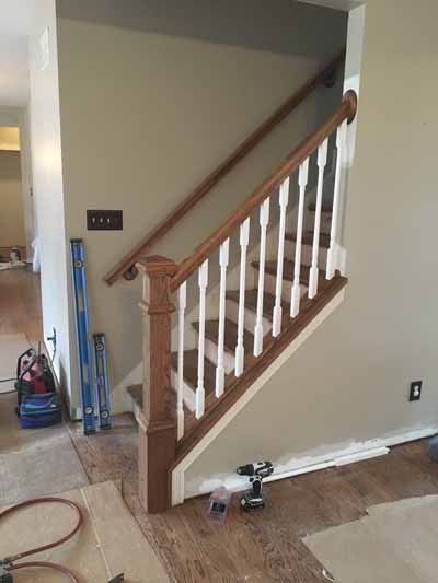 custom stair railing and flooring in progress full