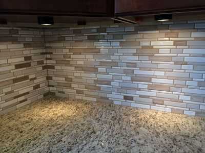Contemporary tile backsplash with granite