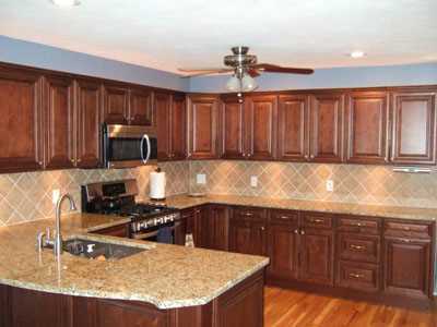 full kitchen remodel with tile, counter, cabinets and fixtures full