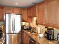 remodeled kitchen with maple cabinets
