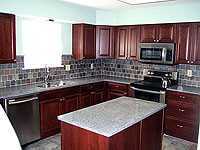 Remodeled kitchen is gorgeous! Granite, tile and cherry.