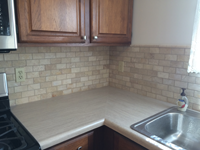 kitchen brick backsplash with formica counter