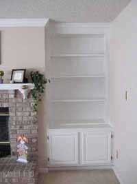 built in bookshelves and mantel with paint