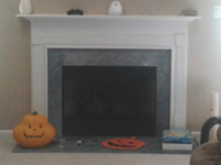 traditional fireplace before remodel