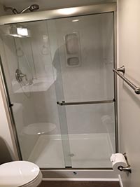 satin nickel shower enclosure and fixtures